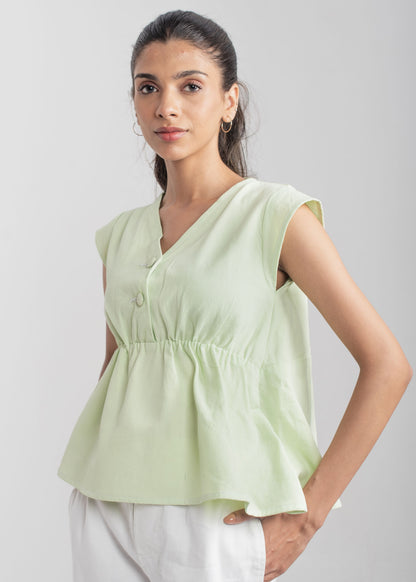 Ladies Peplum Top in Pastel Green