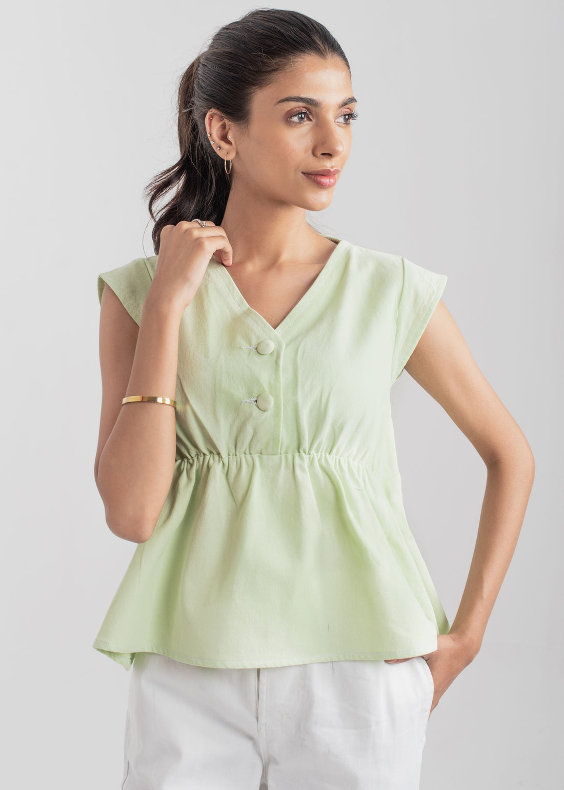 Ladies Peplum Top in Pastel Green