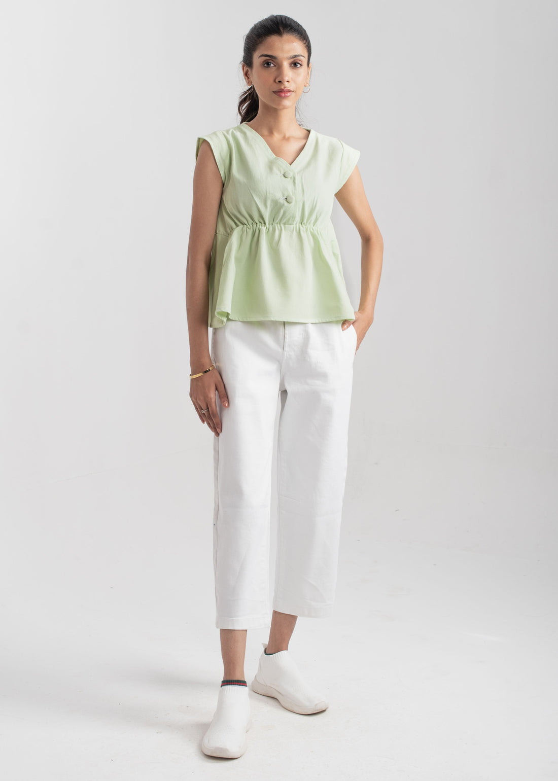 Ladies Peplum Top in Pastel Green