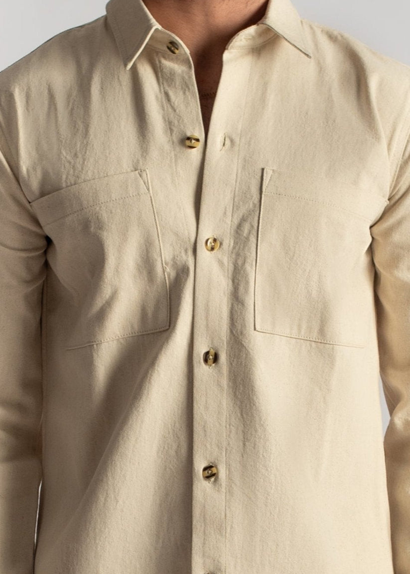 Men's beige denim shirt with button-front closure and casual fit