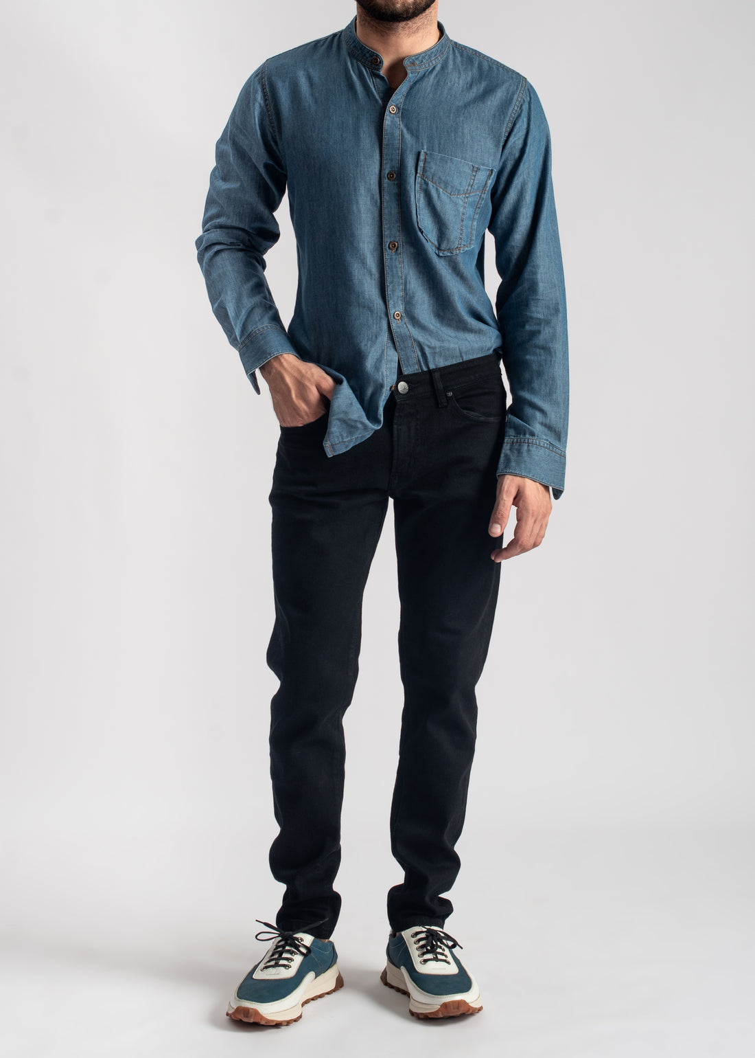 Men's blue denim band collar shirt with relaxed fit and casual styling