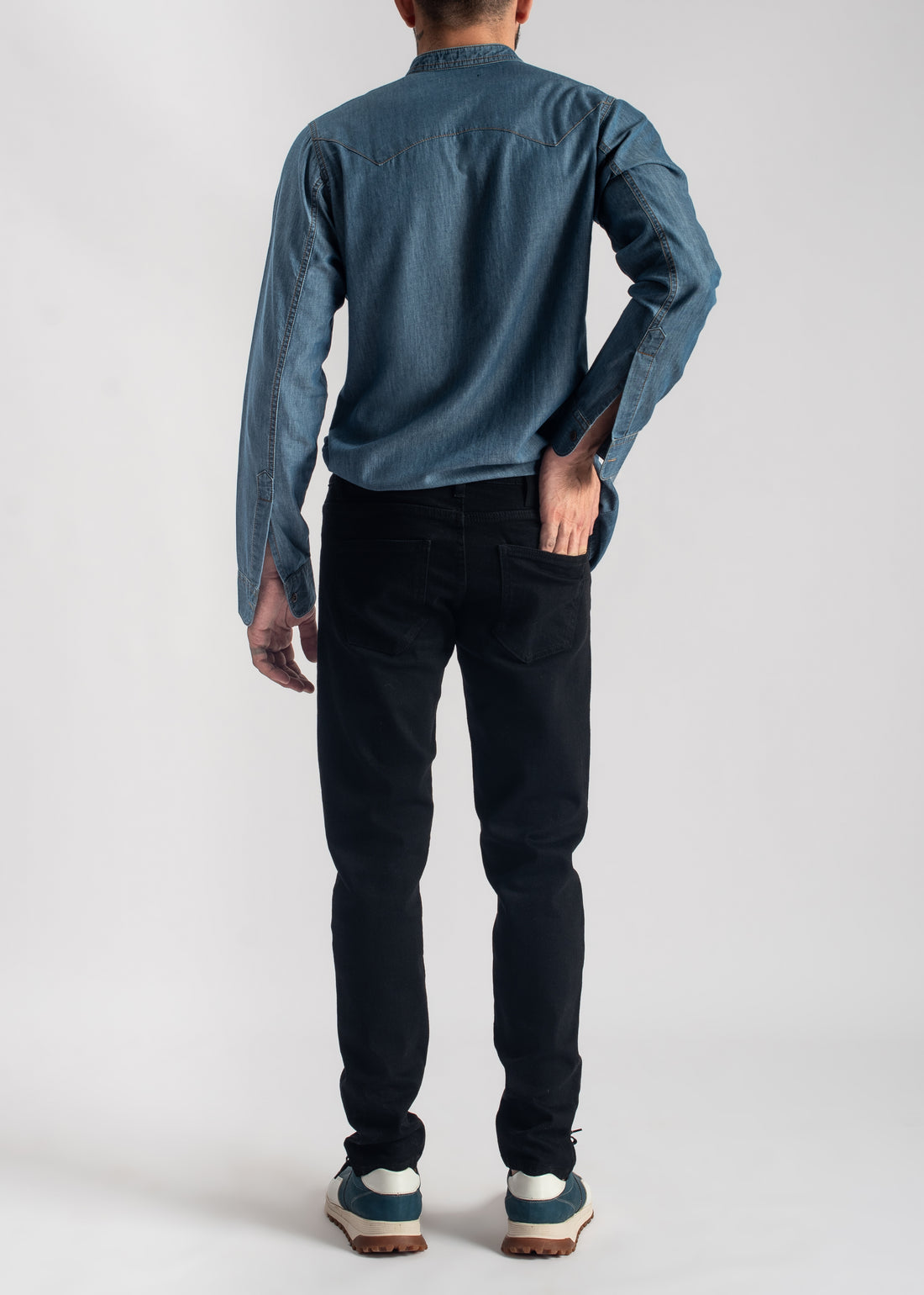 Men's blue denim band collar shirt with relaxed fit and casual styling