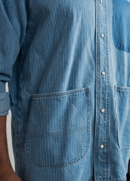 Men's blue striped denim shirt with vertical stripes and relaxed styling