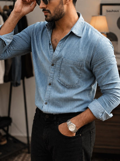 Men's cerulean blue denim shirt with relaxed fit and button-front closure