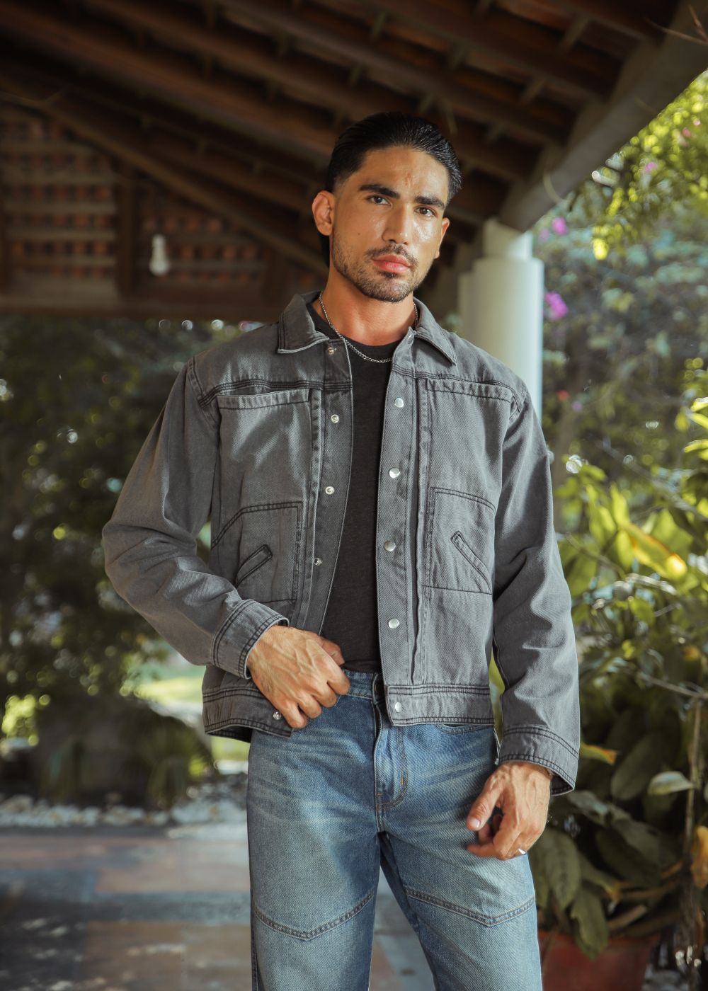 Men's grey denim jacket with button front and chest pockets