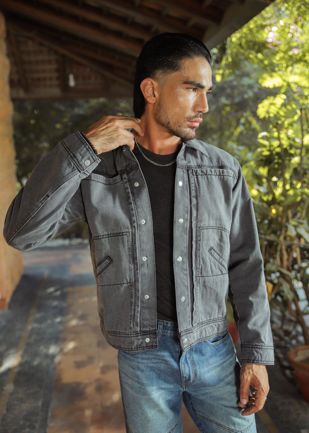 Men's grey denim jacket with button front and chest pockets
