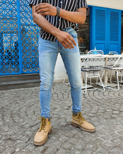 Men’s light blue skinny fit jeans with stretch denim and tapered leg design