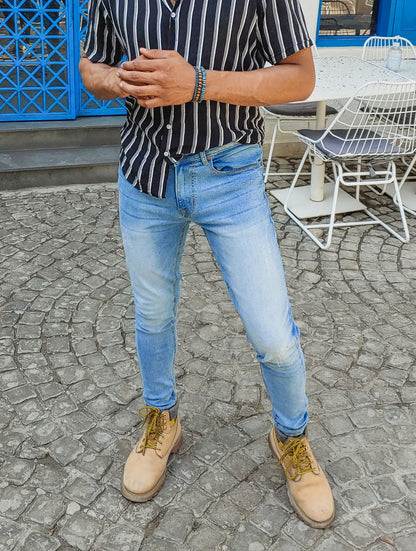 Men’s light blue skinny fit jeans with stretch denim and tapered leg design