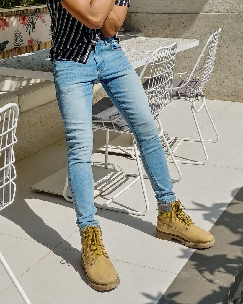 Men’s light blue skinny fit jeans with stretch denim and tapered leg design