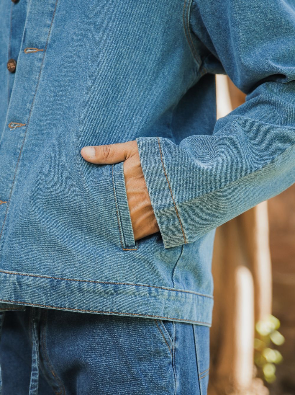 Men's mid blue denim shacket with button front