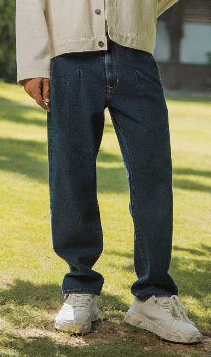 Men’s relaxed fit dark blue pleated jeans with urban style detailing