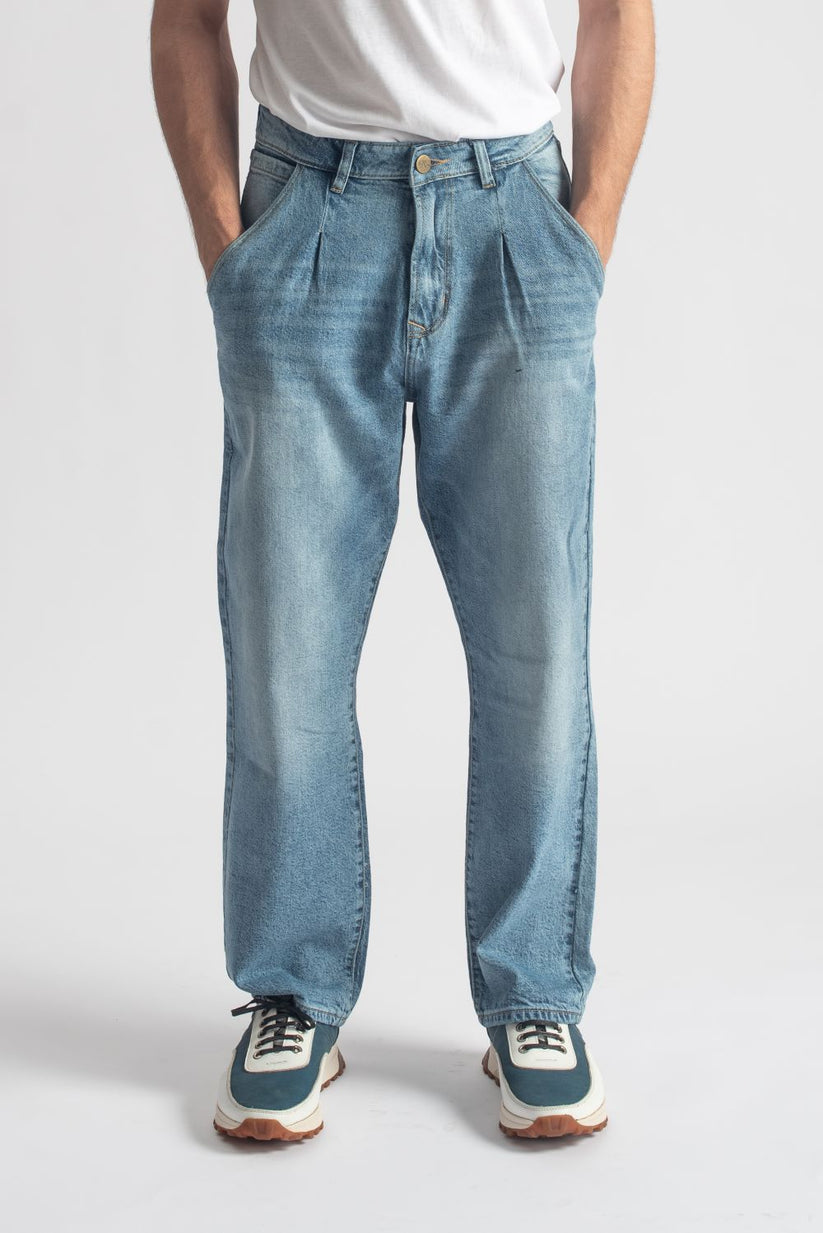 Men's relaxed fit light blue pleated jeans with wide leg silhouette
