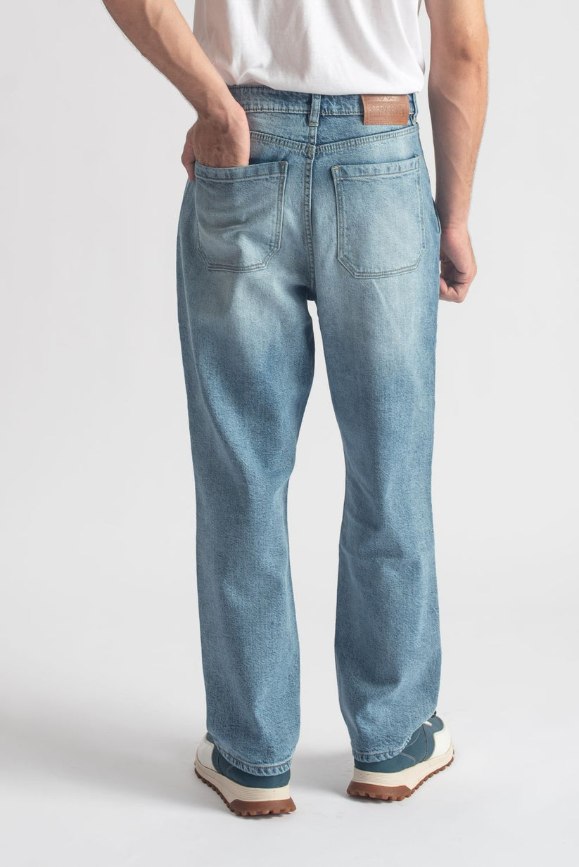 Men's relaxed fit light blue pleated jeans with wide leg silhouette