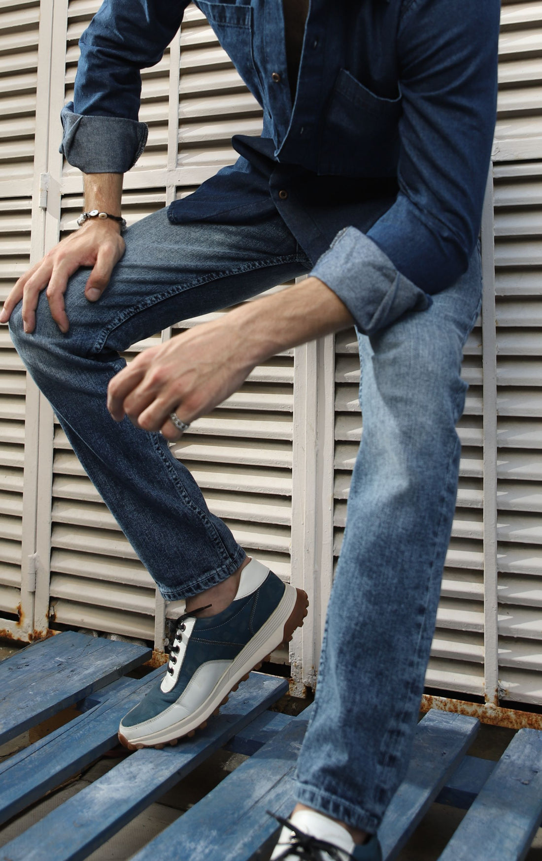 Men’s slim fit acid wash blue jeans with distressed vintage finish