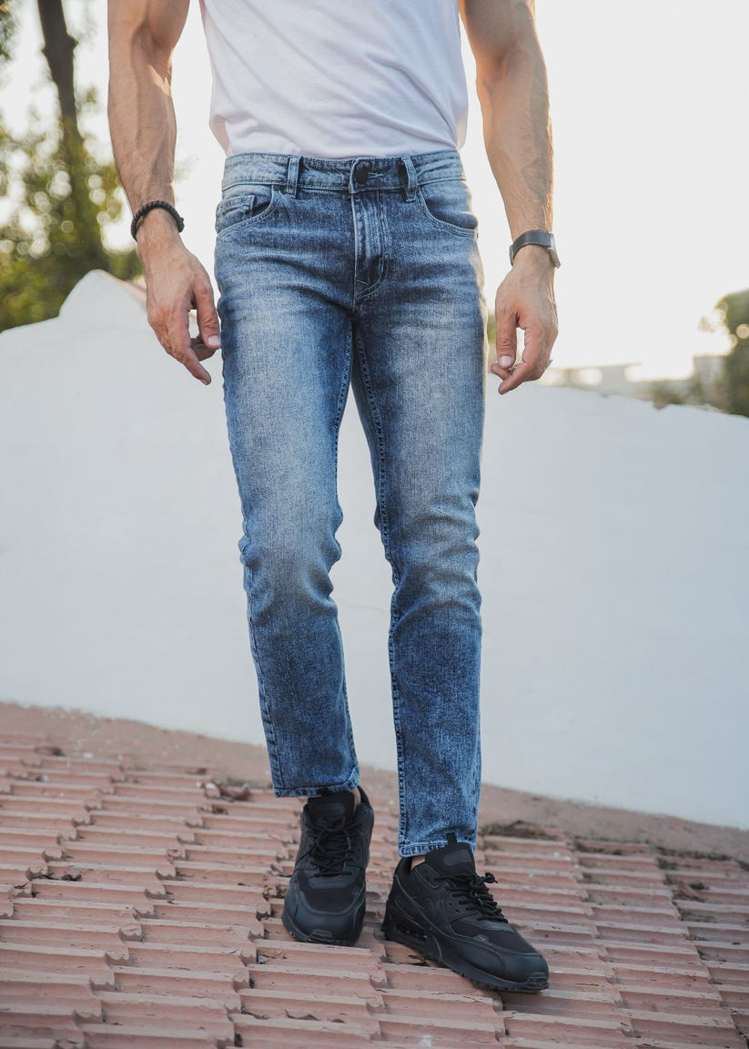 Men’s slim fit acid wash blue jeans with distressed vintage finish