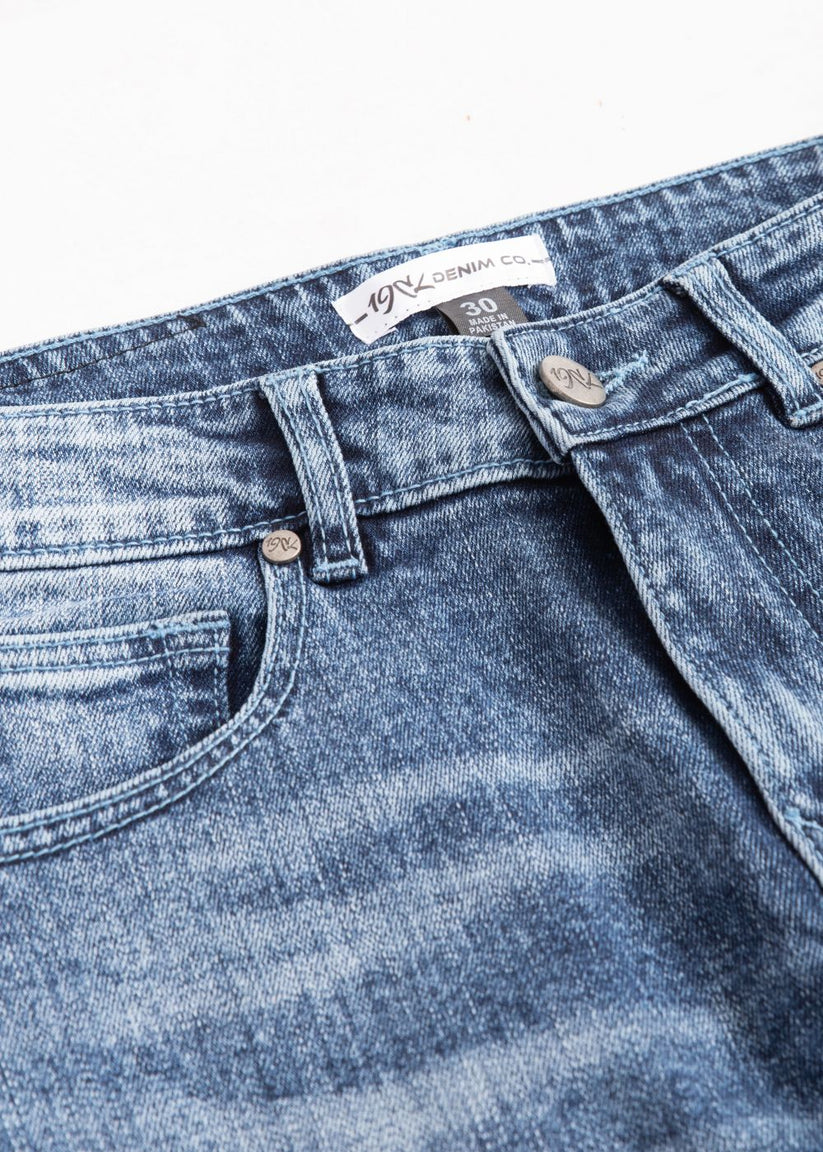 Men’s slim fit acid wash blue jeans with distressed vintage finish