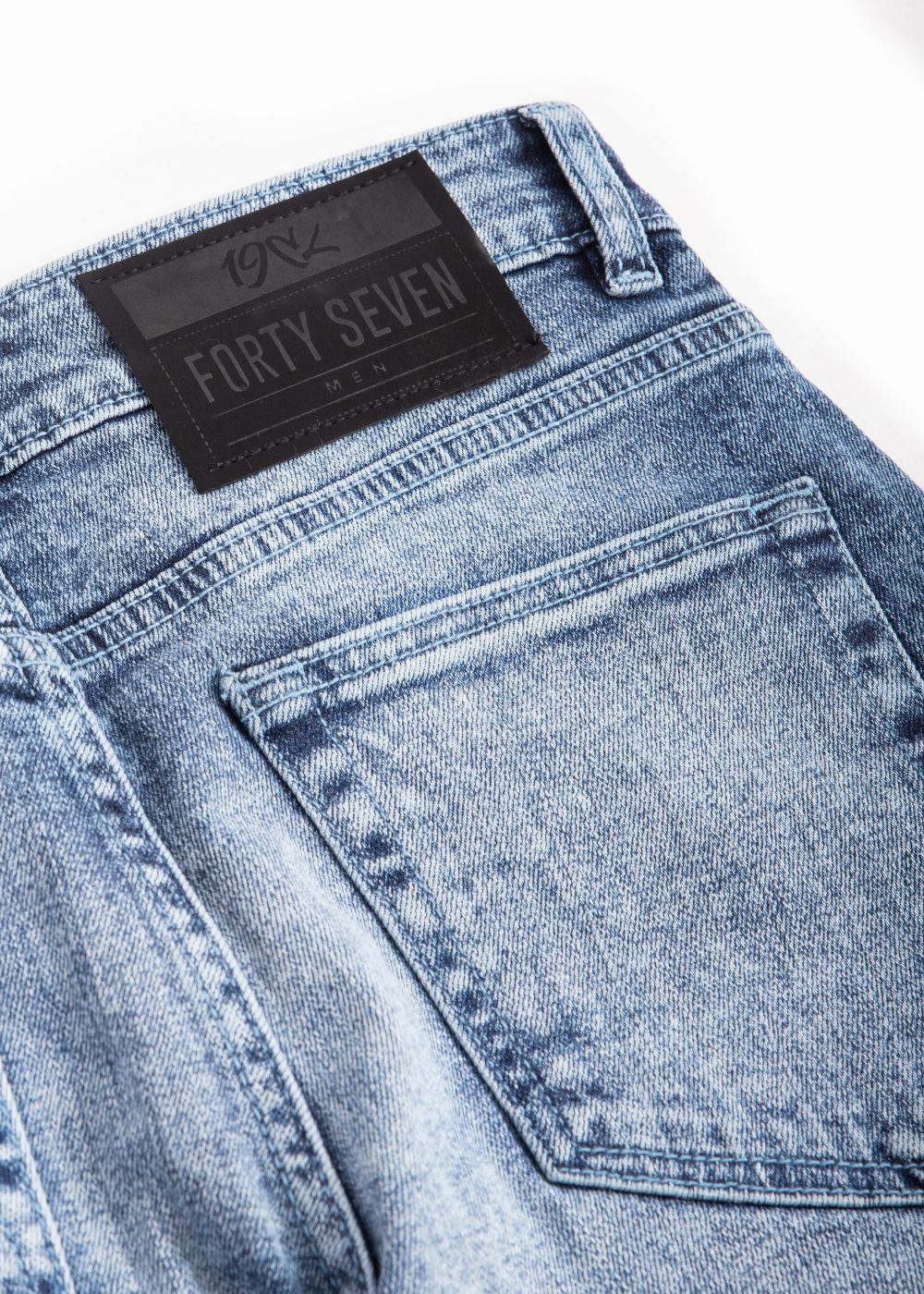 Men’s slim fit acid wash blue jeans with distressed vintage finish