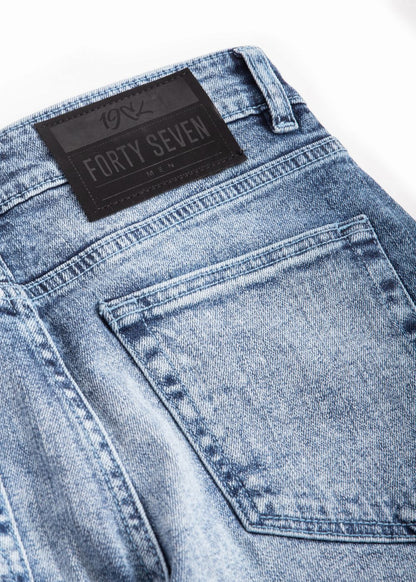 Men’s slim fit acid wash blue jeans with distressed vintage finish
