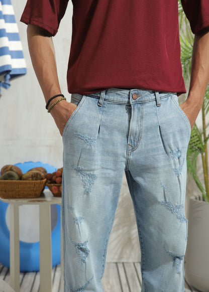 Men's slim fit blue ripped jeans with distressed knee detailing