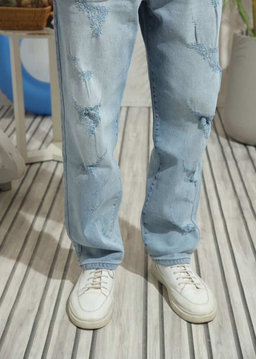 Men's slim fit blue ripped jeans with distressed knee detailing