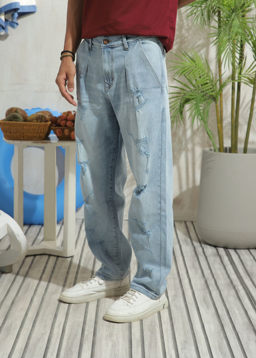 Men's slim fit blue ripped jeans with distressed knee detailing