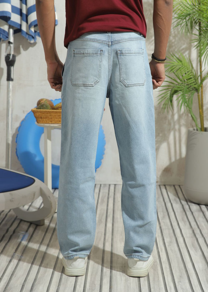 Men's slim fit blue ripped jeans with distressed knee detailing