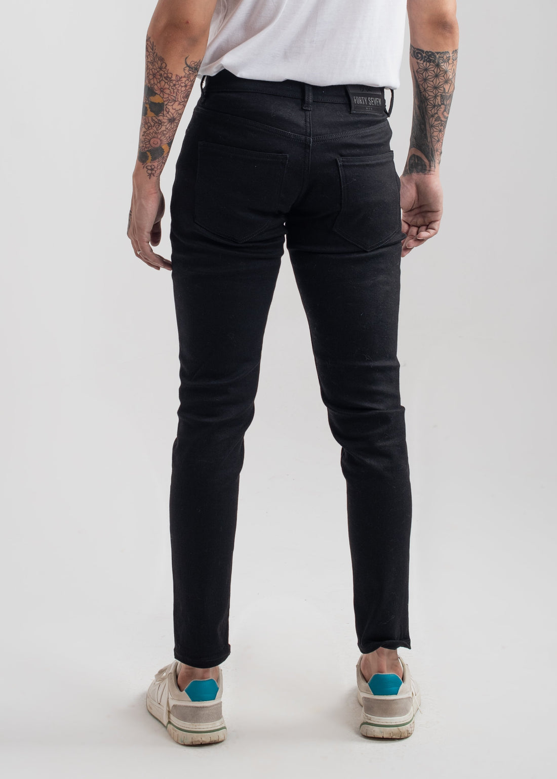 Men's slim fit jet black jeans with clean finish