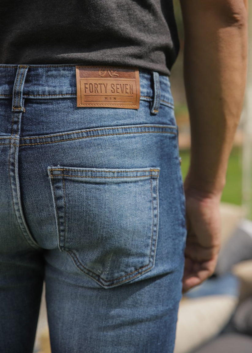 Men’s Slim Fit Light Blue Jeans with Faded Wash Denim and Everyday Casual Style