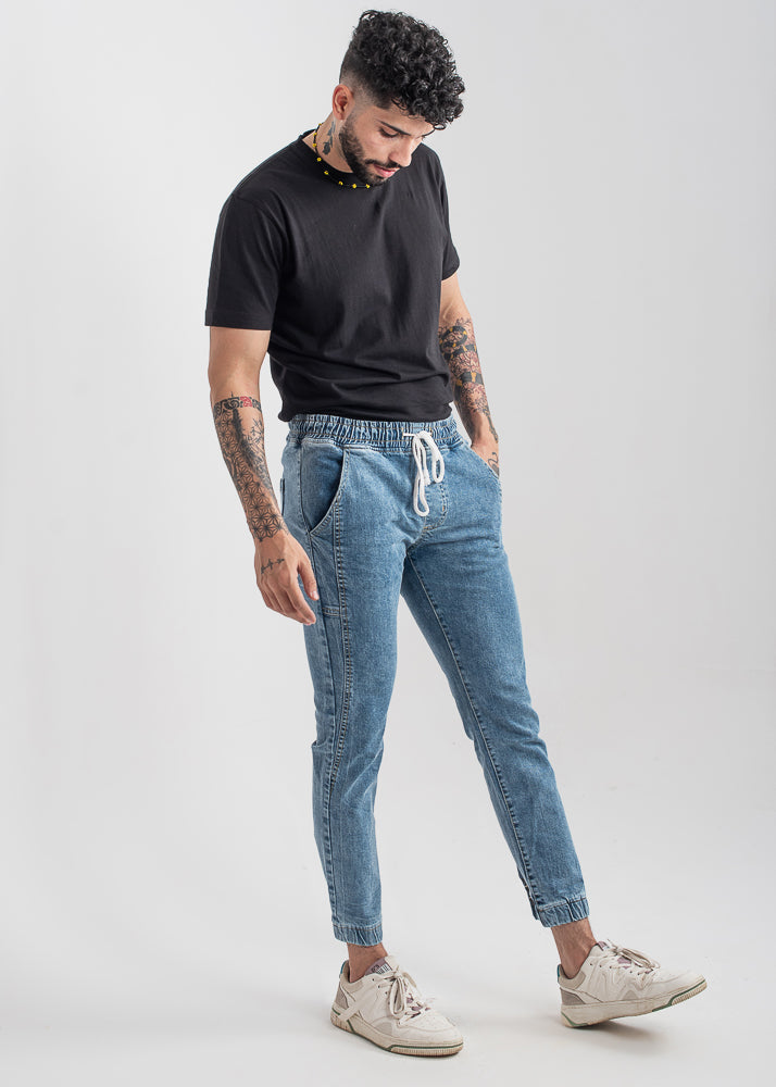 Men's slim fit light blue jog jeans with tapered leg design