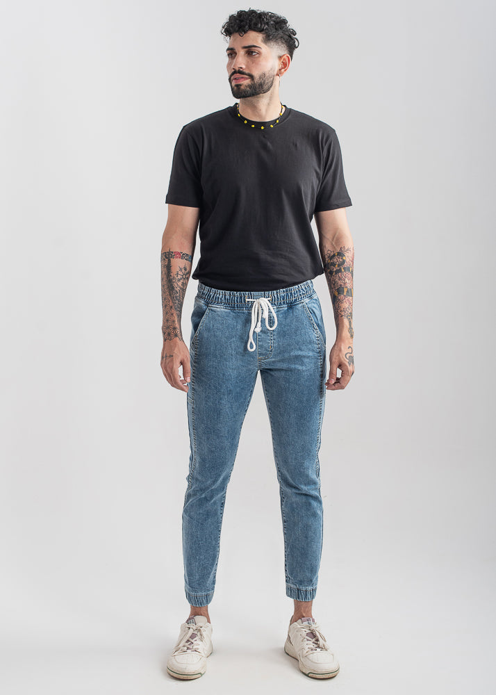 Men's slim fit light blue jog jeans with tapered leg design