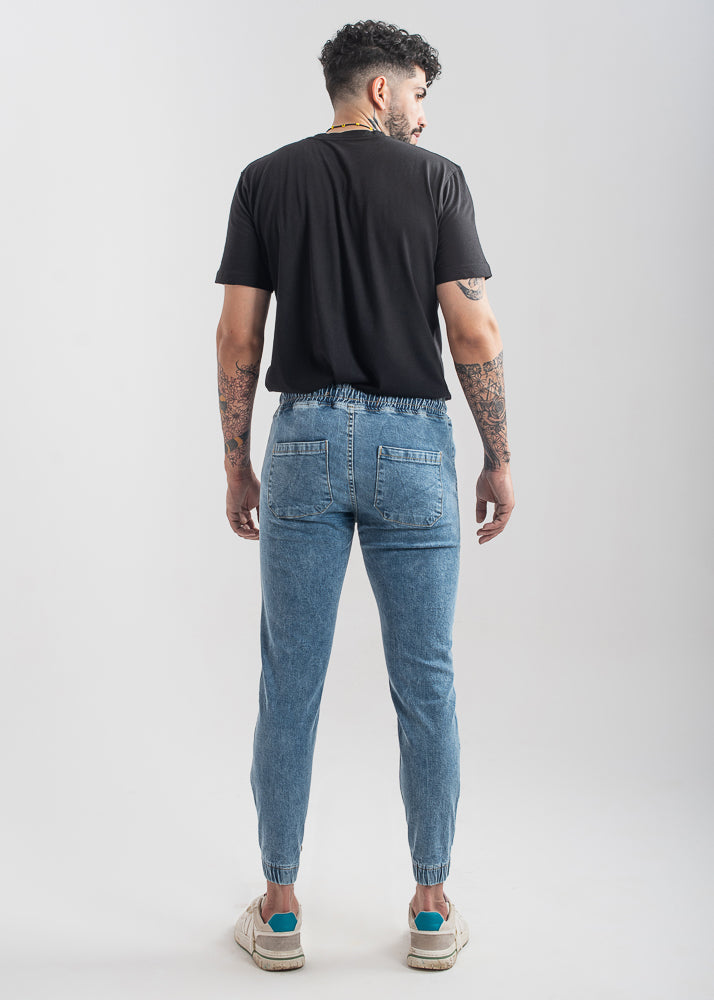 Men's slim fit light blue jog jeans with tapered leg design