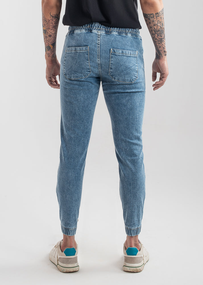 Men's slim fit light blue jog jeans with tapered leg design
