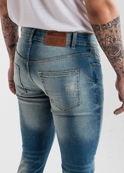 sand-blasted light blue skinny ripped jeans men low-rise stretch denim