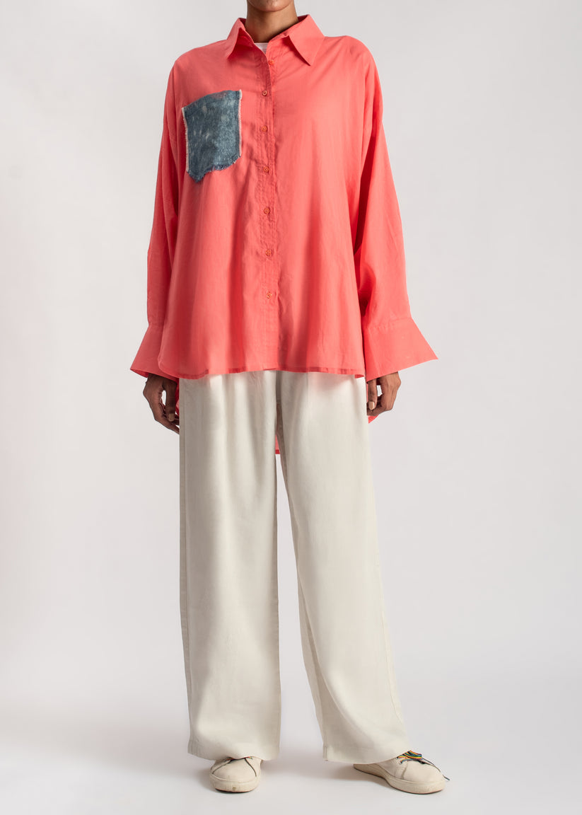 Women's Button Down Shirt in Orange with a frayed Denim Pocket and Back Patch
