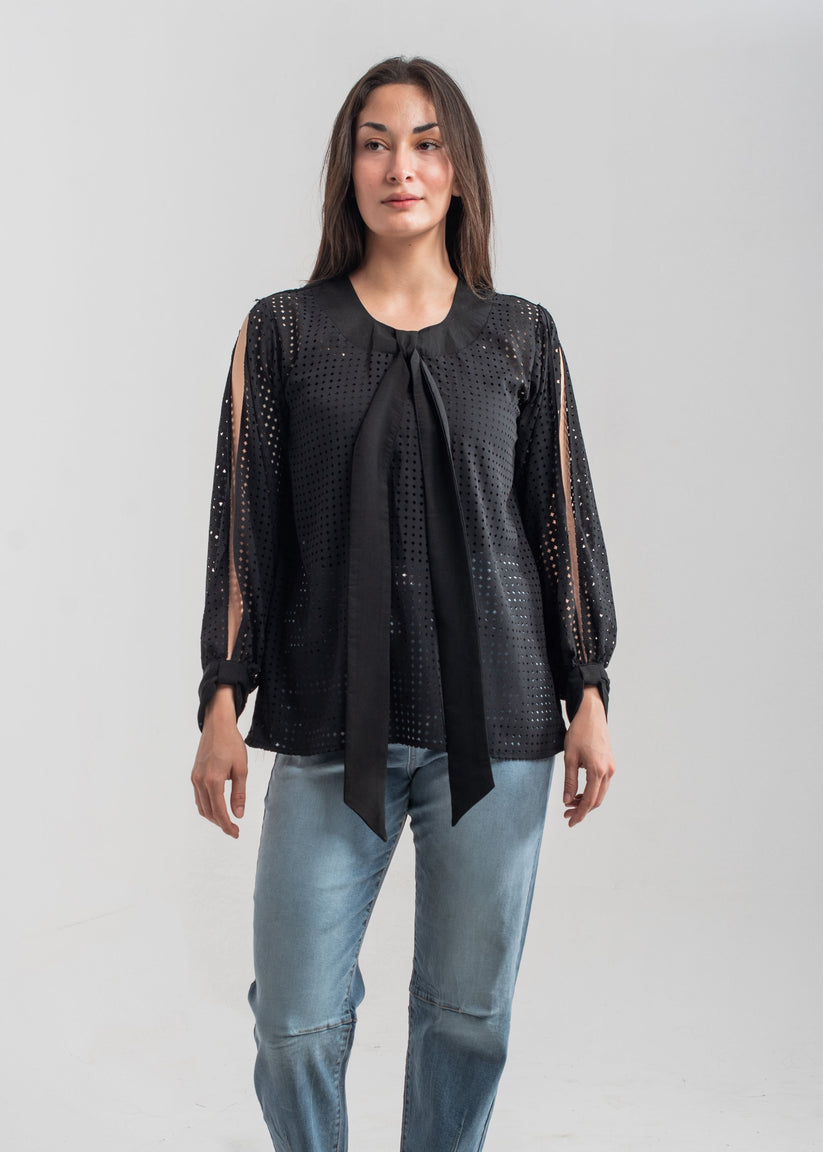 Women's formal top in black with laser cut details