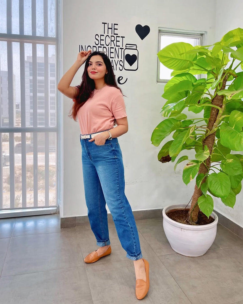 Women's Mom Jeans in Blue with a Straight Style and a High, Rounded Waist.