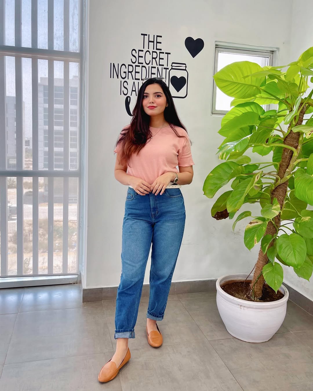 Women's Mom Jeans in Blue with a Straight Style and a High, Rounded Waist.