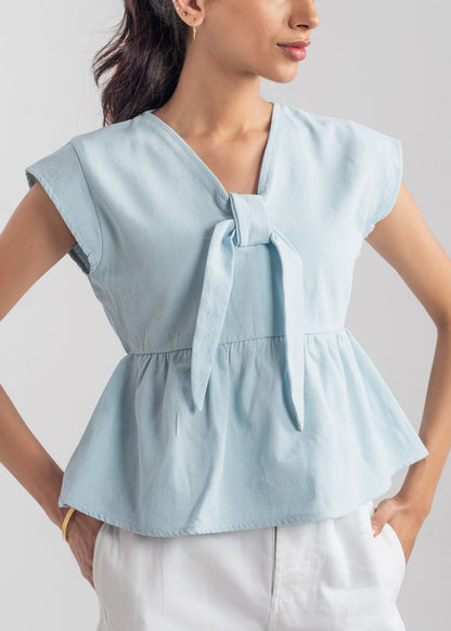 Women's Peplum Top in Pastel Blue with a Bow in Front