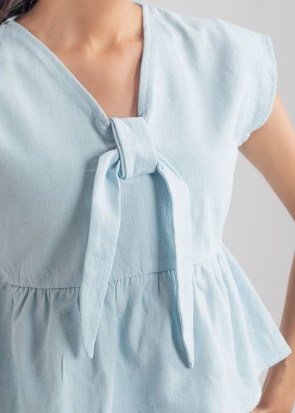 Women's Peplum Top in Pastel Blue with a Bow in Front
