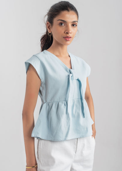 Women's Peplum Top in Pastel Blue with a Bow in Front