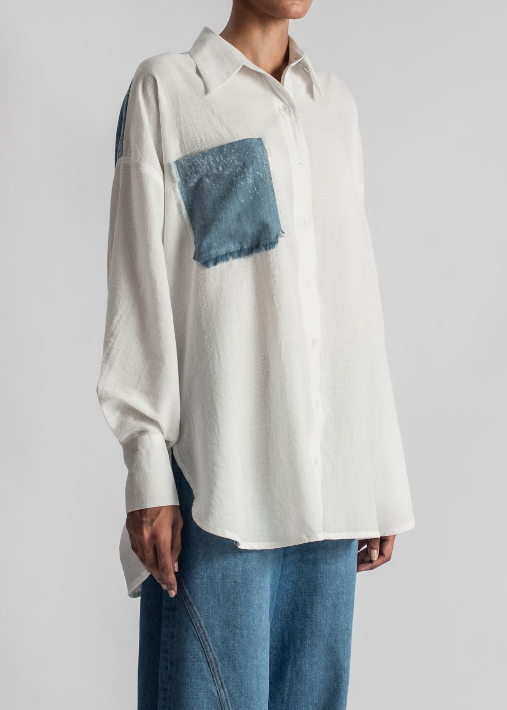 Women's White Loose Shirt Featuring a Frayed Denim Pocket and Back Patch