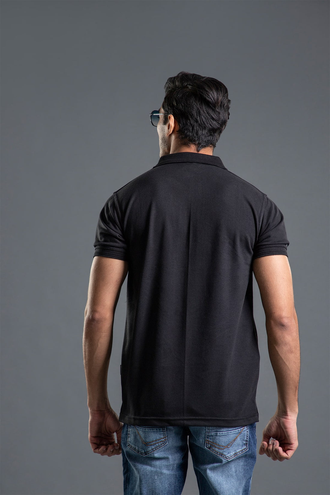 Men's regular fit black polo shirt with classic collar
