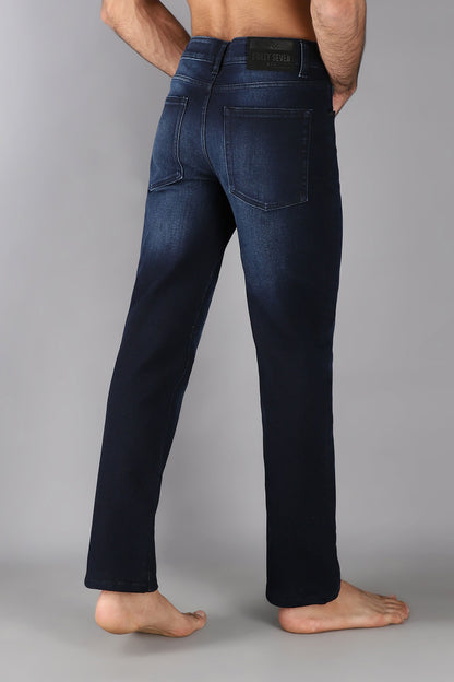 Men's slim fit dark blue jeans with whiskered wash detailing