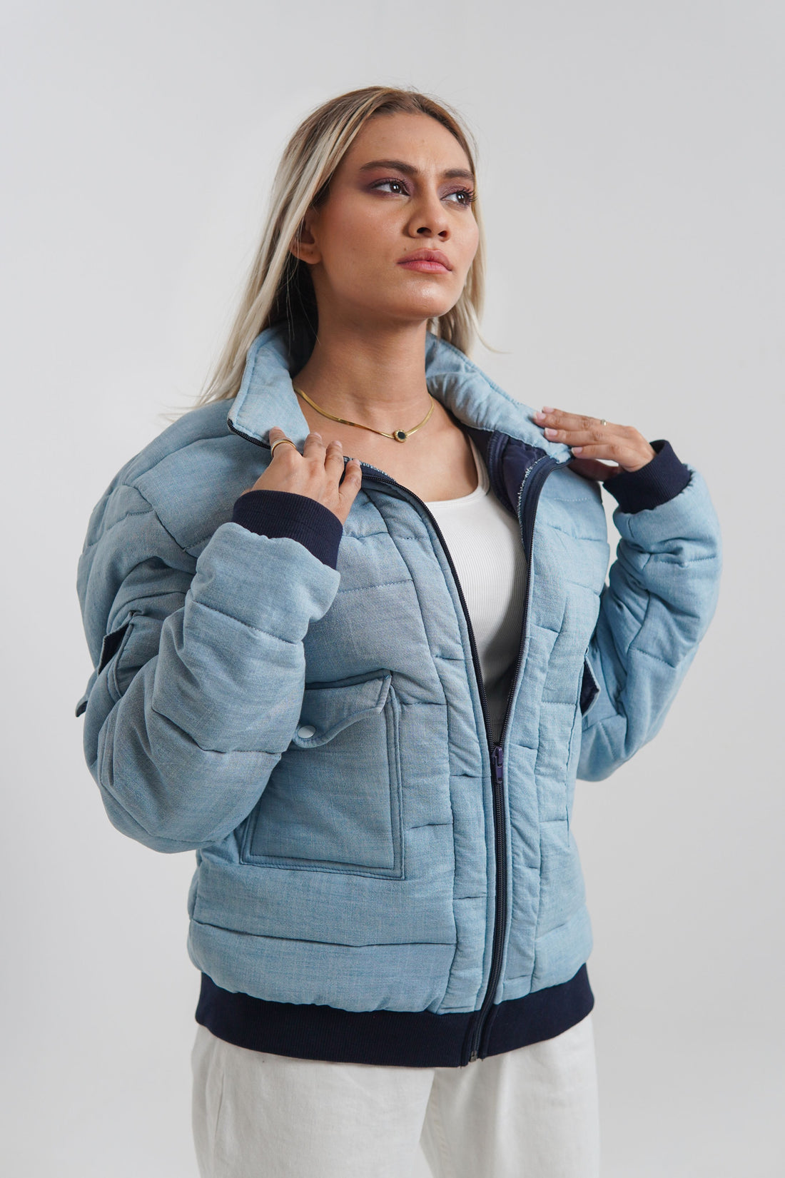 Ladies blue puffer jacket with collar and cuffs