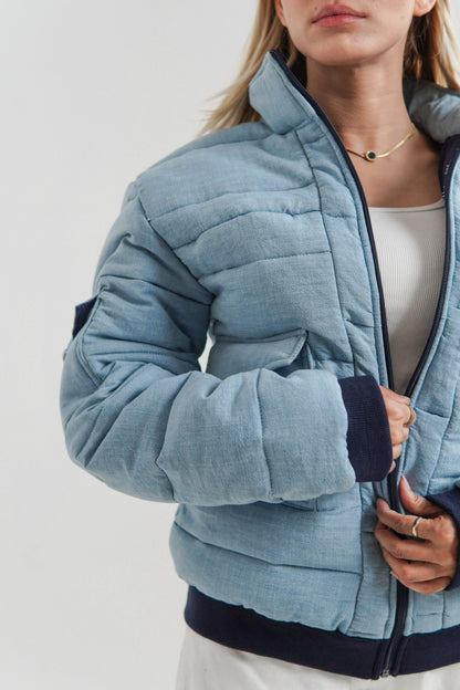 Ladies blue puffer jacket with collar and cuffs