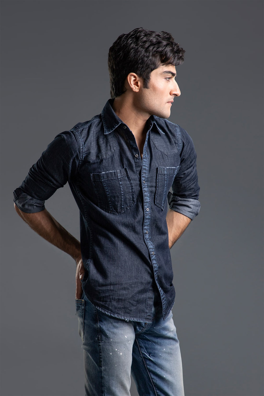 Men's black casual shirt with slim fit and button-front design for versatile styling