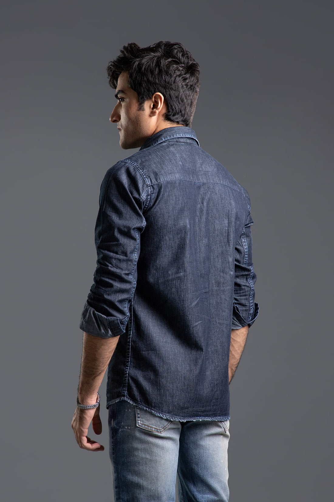 Men's black casual shirt with slim fit and button-front design for versatile styling