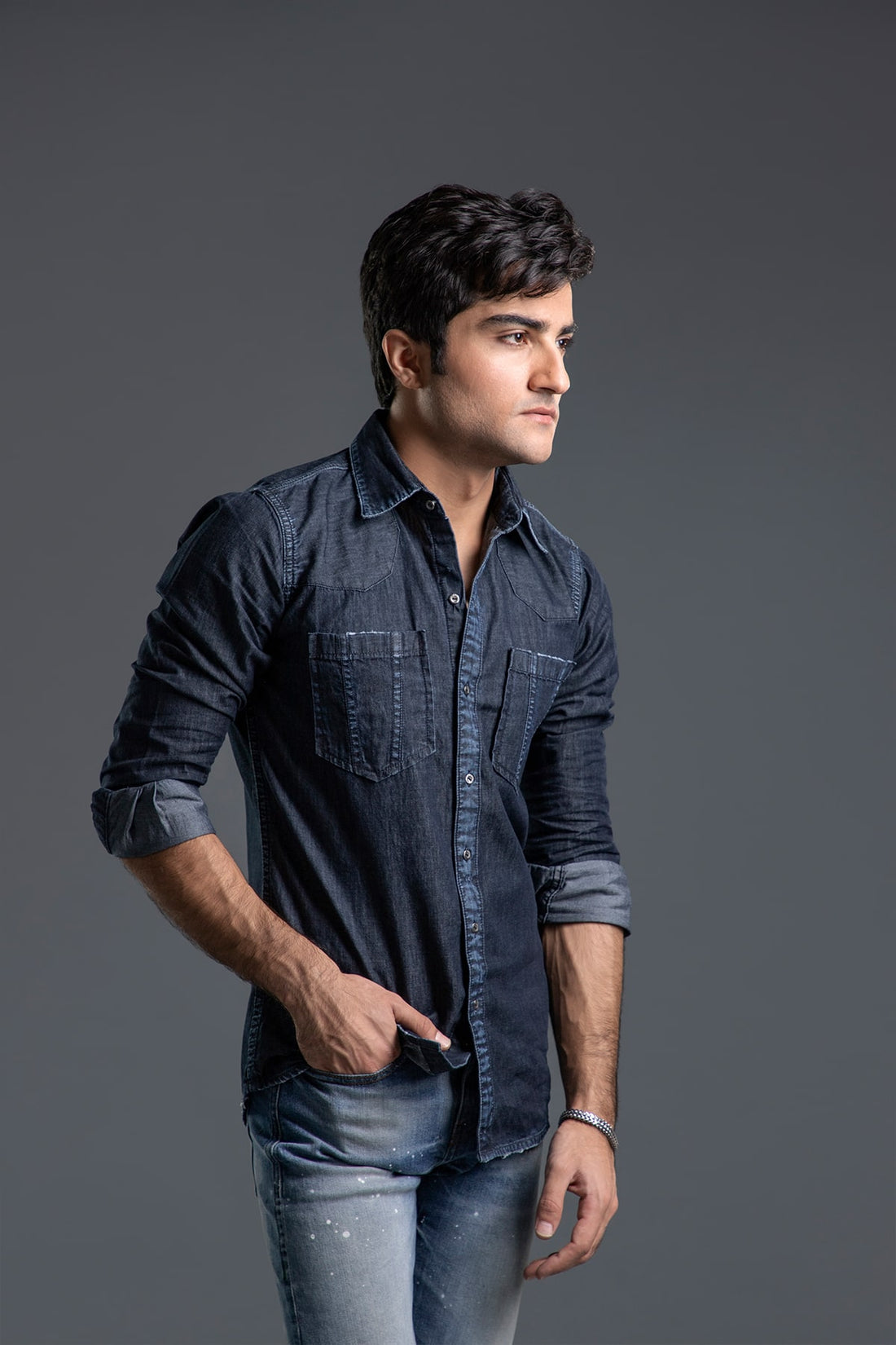 Men's black casual shirt with slim fit and button-front design for versatile styling