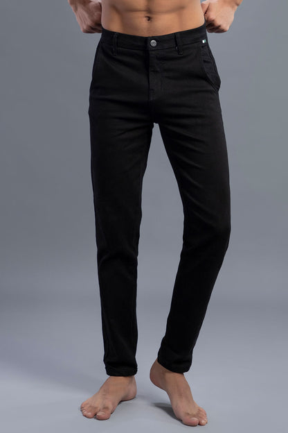 Men’s black skinny fit jeans with stretch fabric and tapered ankle design