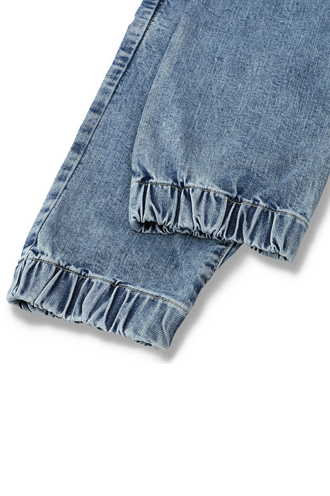 Men's slim fit light blue jog jeans with tapered leg design